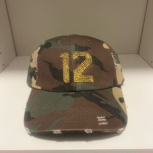 Custom ordered “12’s” Camouflage Seahawks trucker. Gold rhinestones placed.